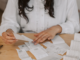 women organizing receipts