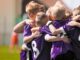 kids celebrating soccer game win